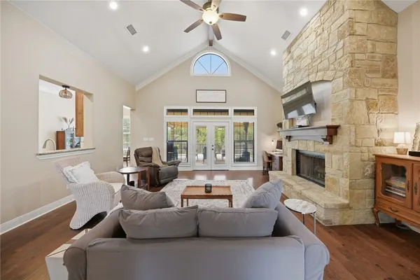 a large kitchen with stainless steel appliances kitchen island granite countertop a large counter top cabinets and stainless steel appliances