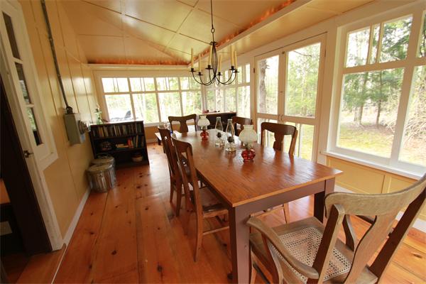 74 Ranney Corner Road Ashfield, MA 01330 - Photo 18 of 24 a view of a dining room with furniture window and outside view