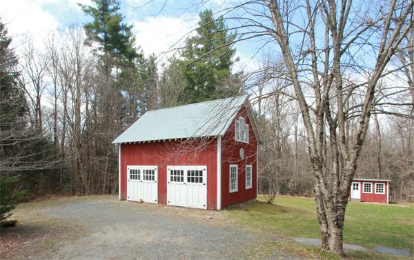 74 Ranney Corner Road Ashfield, MA 01330 - Photo 2 of 24 a view of a house with a yard and large trees
