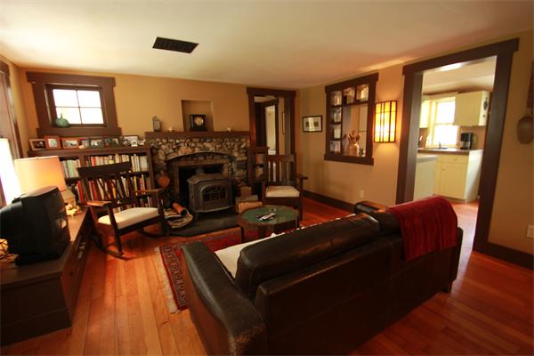 74 Ranney Corner Road Ashfield, MA 01330 - Photo 5 of 24 a living room with furniture and a fireplace