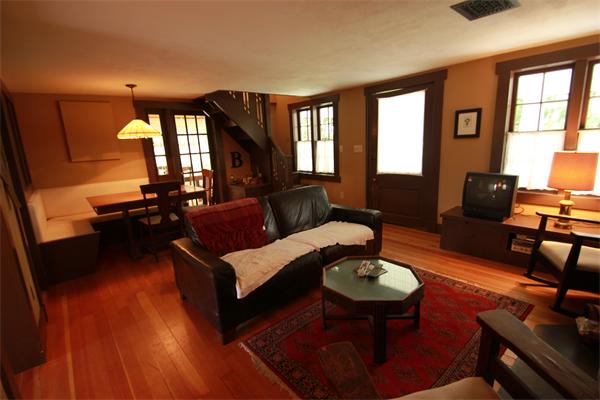 74 Ranney Corner Road Ashfield, MA 01330 - Photo 6 of 24 a living room with furniture and a wooden floor
