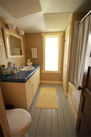 74 Ranney Corner Road Ashfield, MA 01330 - Photo 9 of 24 a bathroom with a granite countertop sink toilet and shower