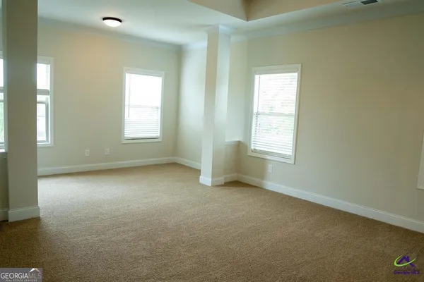 an empty room with windows