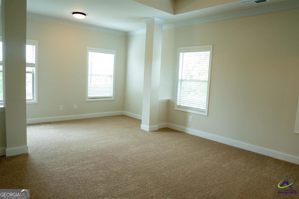 119 Bluecoat Trail Byron, GA 31008 - Photo 16 of 37 an empty room with windows