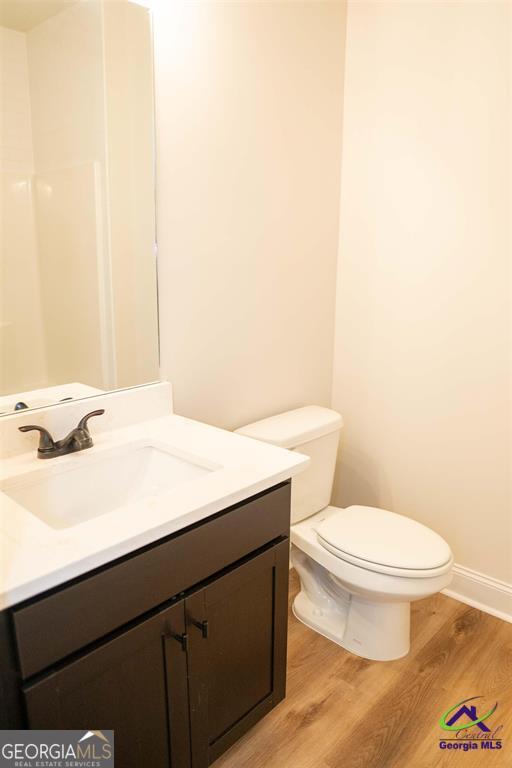 119 Bluecoat Trail Byron, GA 31008 - Photo 21 of 37 a bathroom with a sink and a toilet