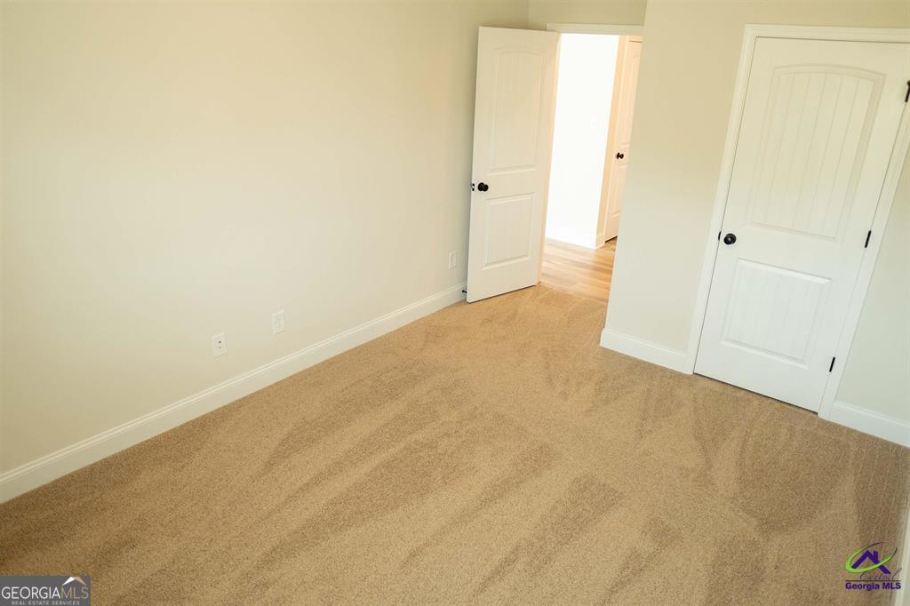 119 Bluecoat Trail Byron, GA 31008 - Photo 22 of 37 a view of an empty room