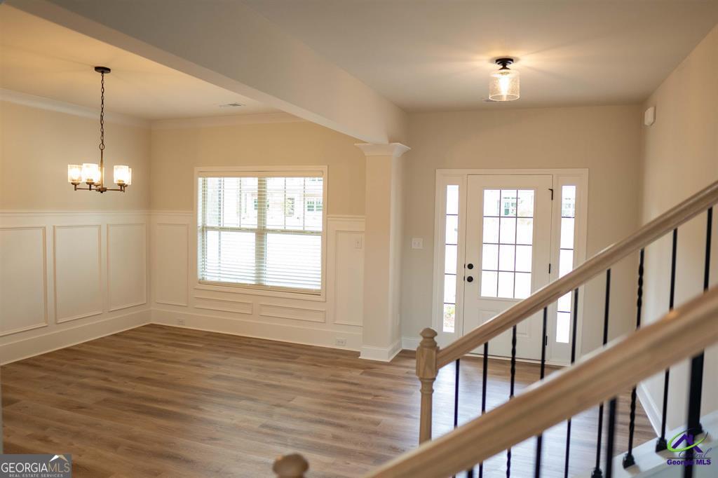119 Bluecoat Trail Byron, GA 31008 - Photo 32 of 37 a view of an entryway with wooden floor