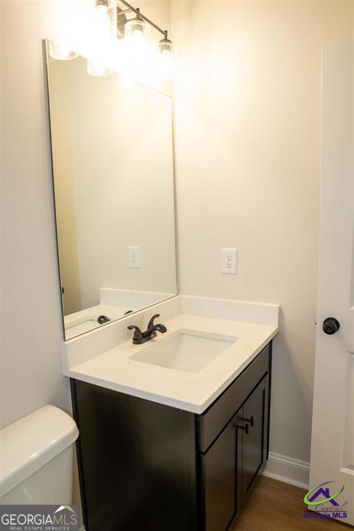 119 Bluecoat Trail Byron, GA 31008 - Photo 5 of 37 a bathroom with a sink and a toilet