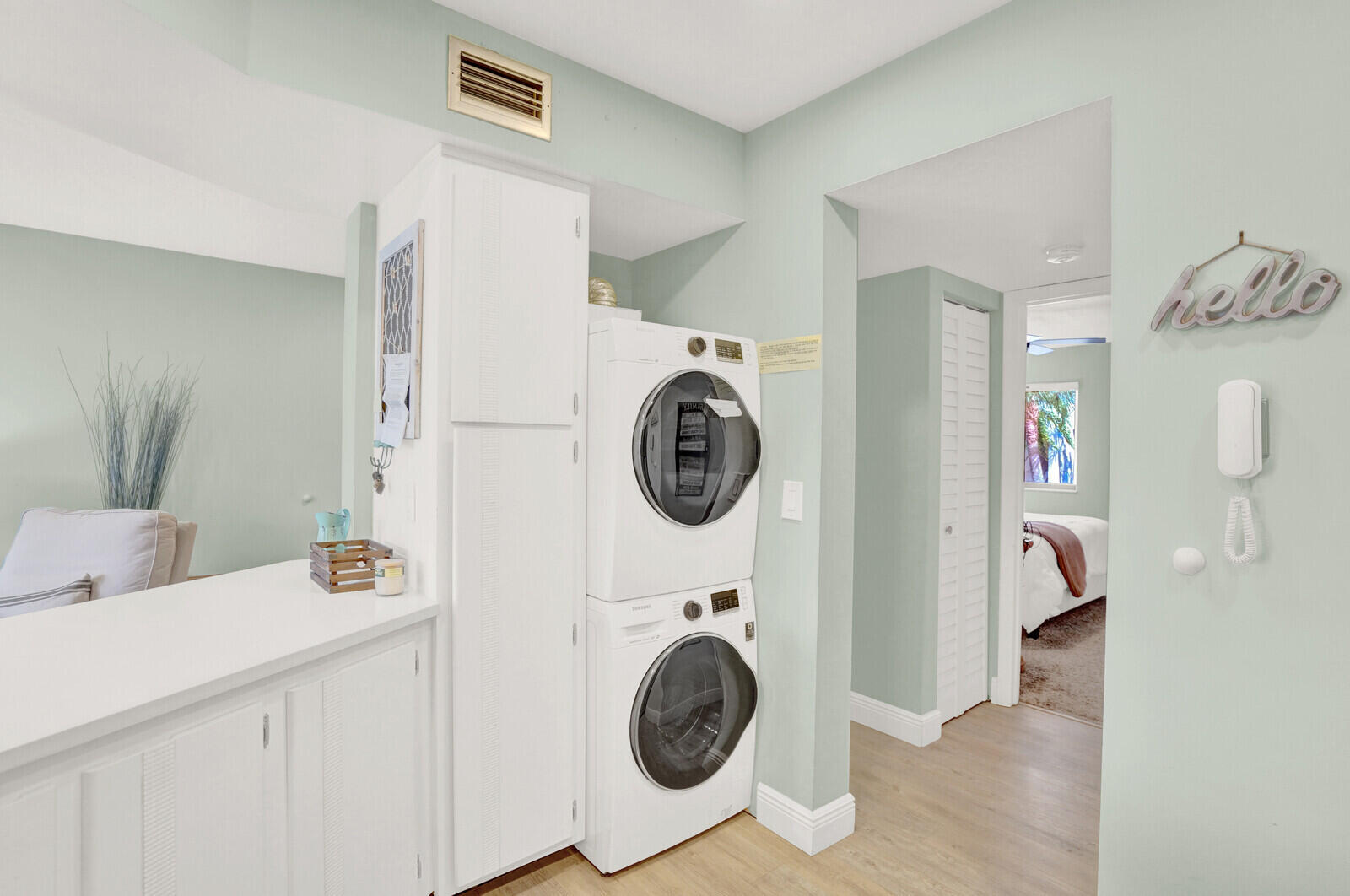 1605 Highway 1, Unit 202V5 Jupiter, FL 33477 - Photo 12 of 26 a utility room with sink dryer and washer