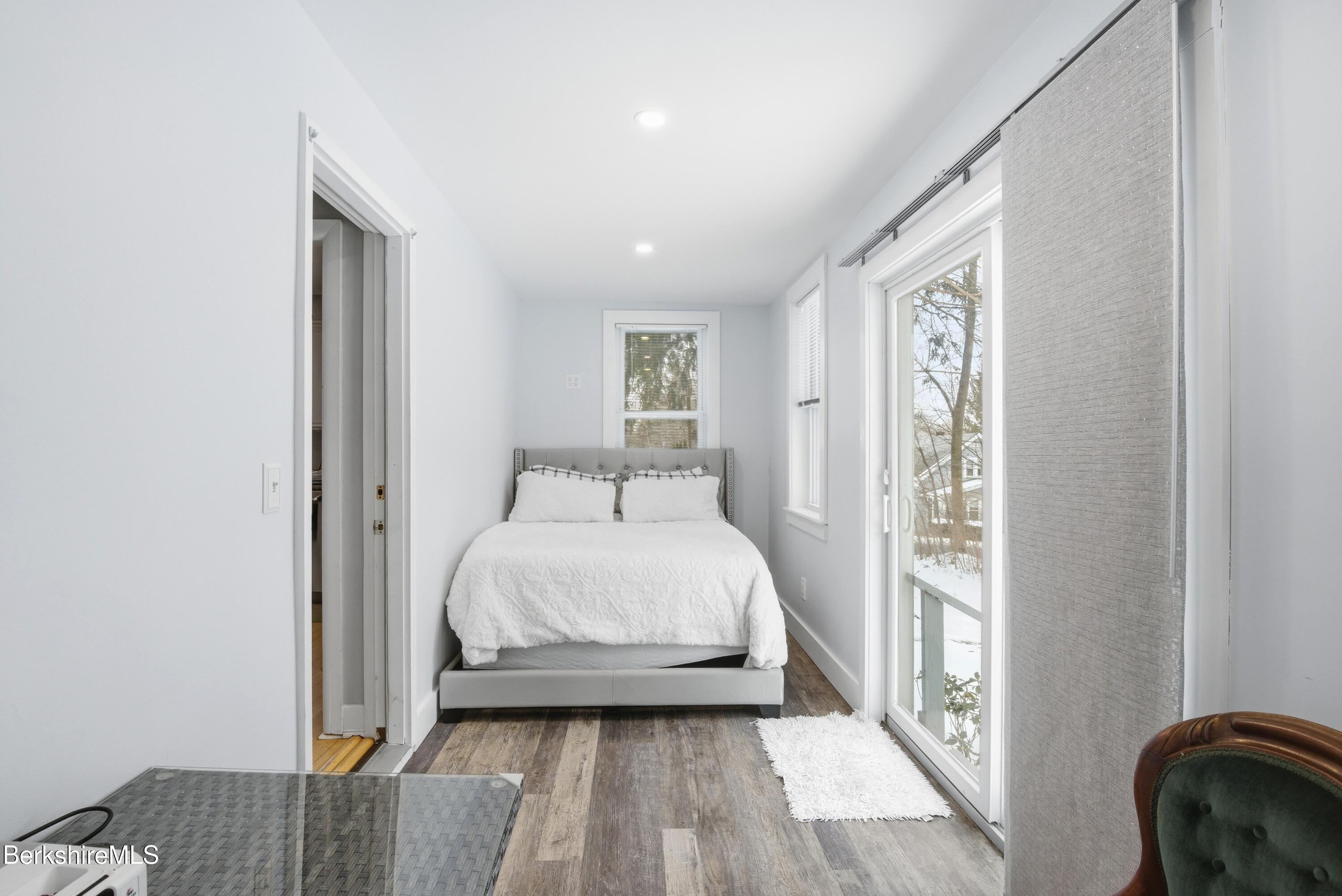 6 Vine Street Pittsfield, MA 01201 - Photo 18 of 37 a bedroom with a bed and a window