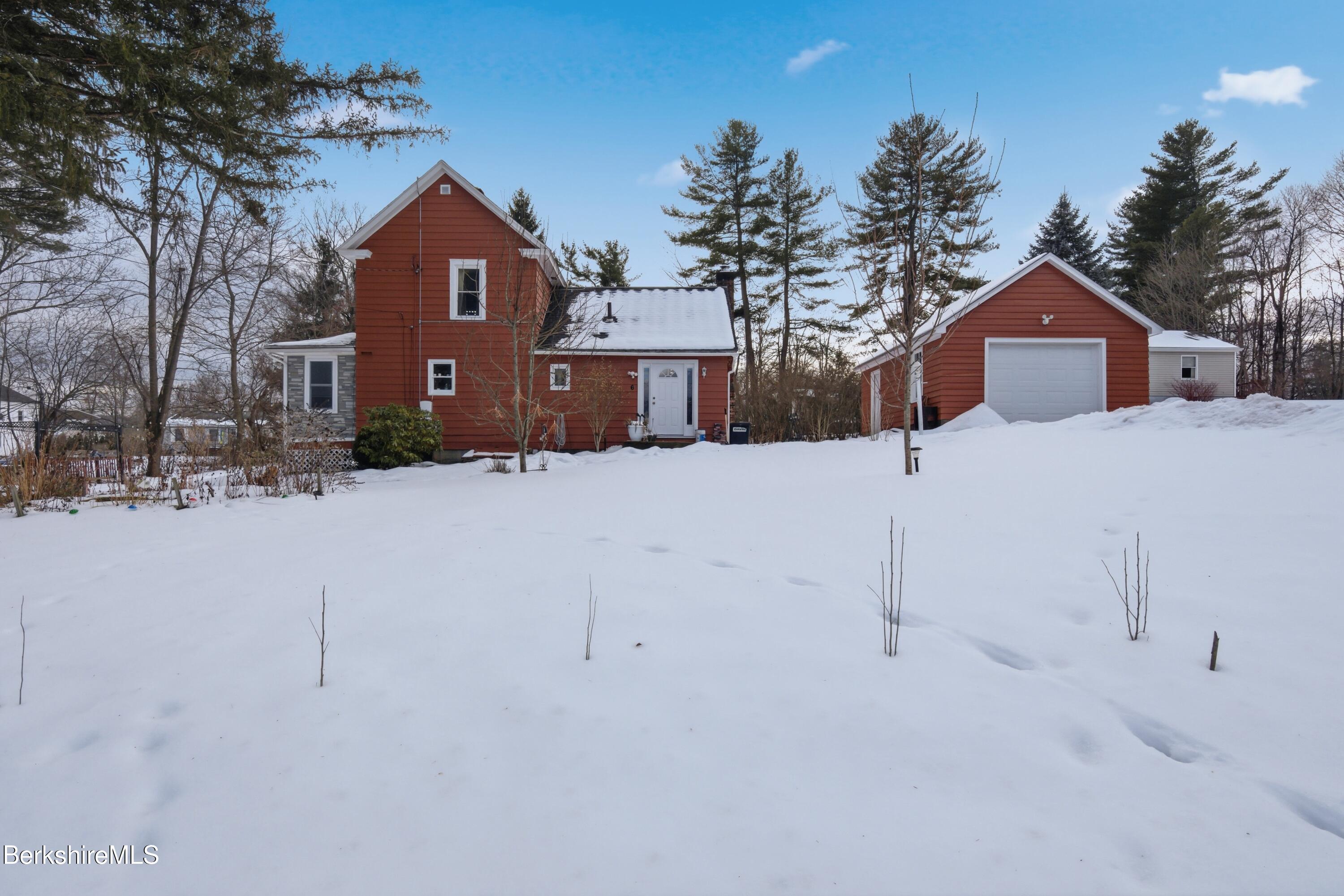 6 Vine Street Pittsfield, MA 01201 - Photo 2 of 37 a front view of a house with a yard