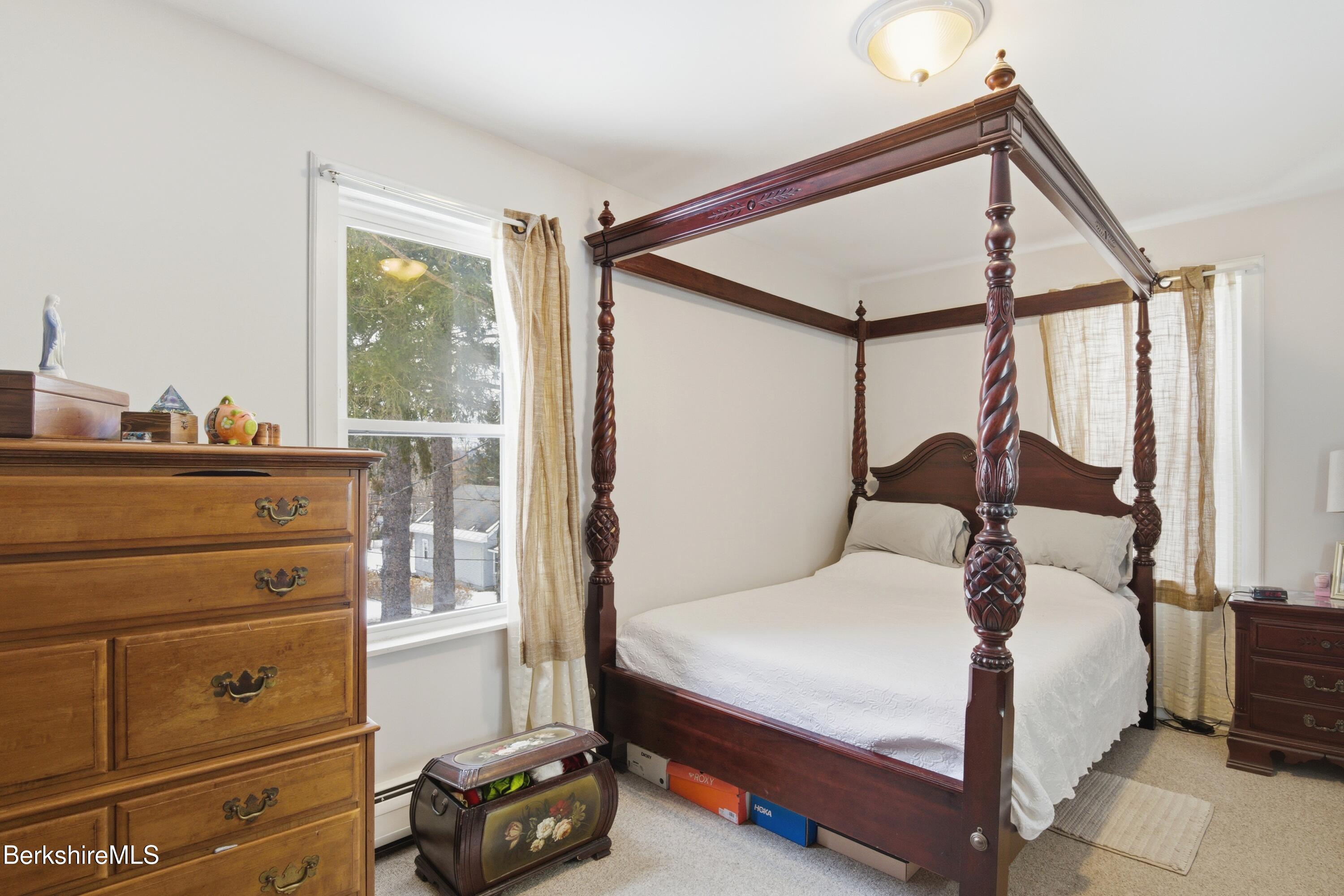 6 Vine Street Pittsfield, MA 01201 - Photo 26 of 37 a bedroom with a bed and large windows