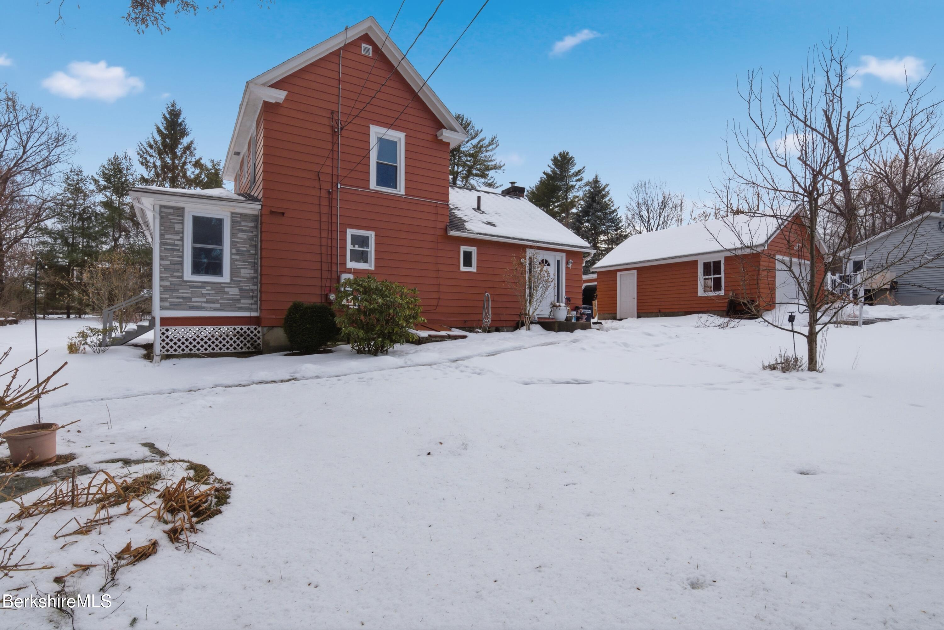 6 Vine Street Pittsfield, MA 01201 - Photo 3 of 37 a front view of a house with a yard