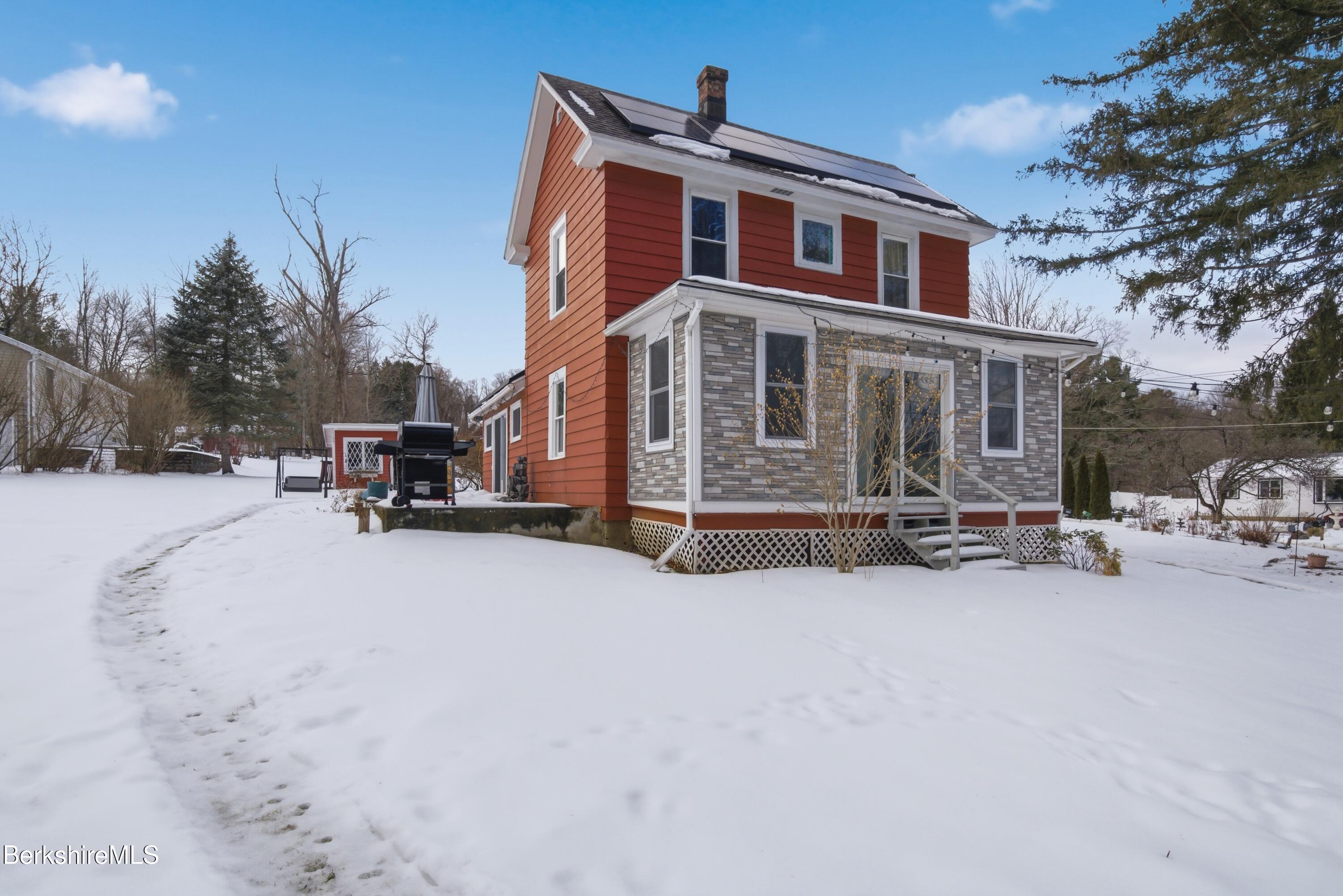 6 Vine Street Pittsfield, MA 01201 - Photo 33 of 37 a view of a house with a snow in the road