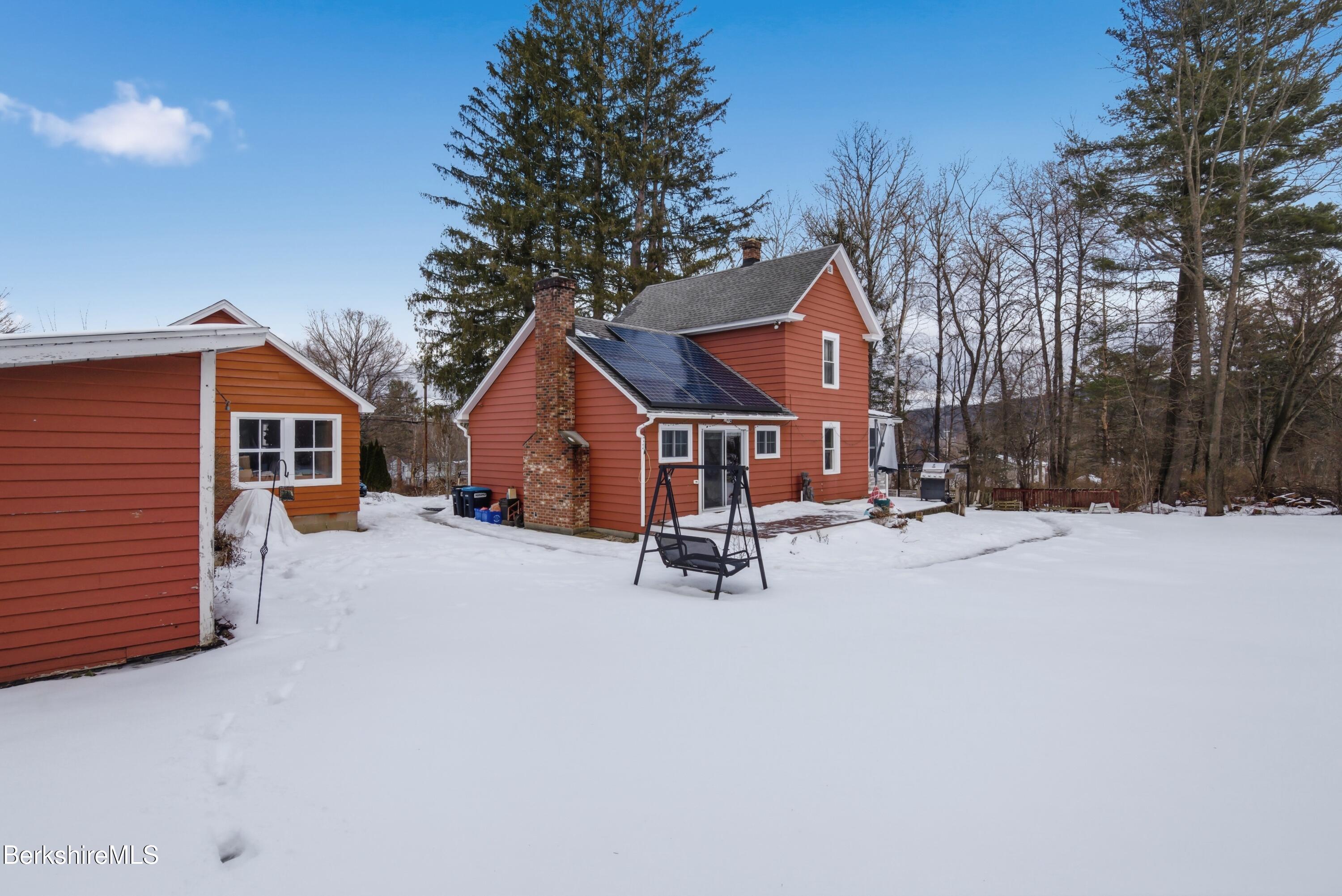 6 Vine Street Pittsfield, MA 01201 - Photo 34 of 37 a view of a house with a yard and covered with snow in the background
