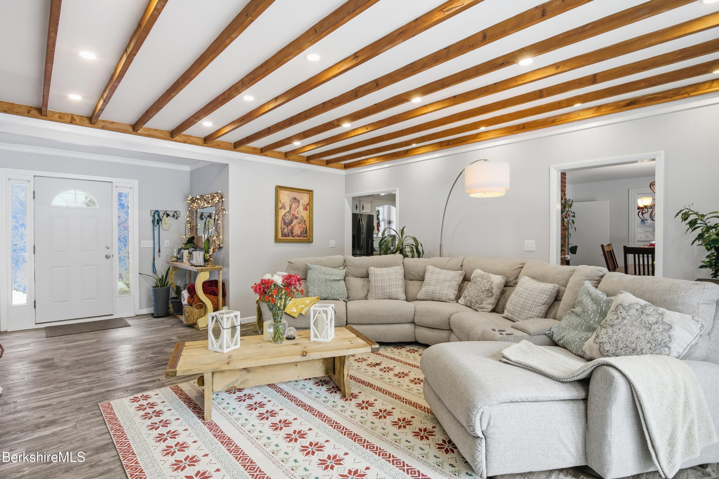 6 Vine Street Pittsfield, MA 01201 - Photo 7 of 37 a living room with furniture and wooden floor