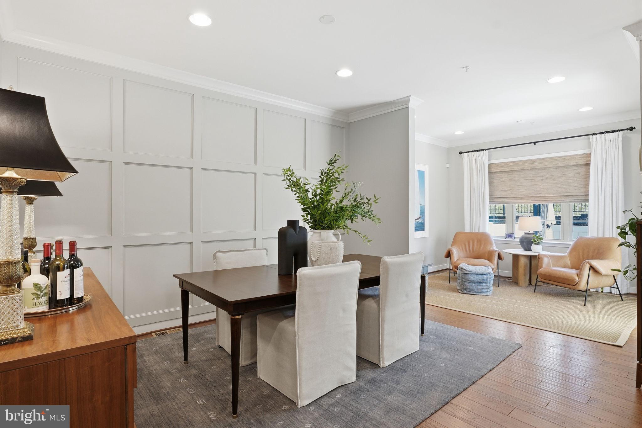 126 Admirals Ridge Drive Arnold, MD 21012 - Photo 12 of 58 a view of a livingroom with furniture and a potted plant