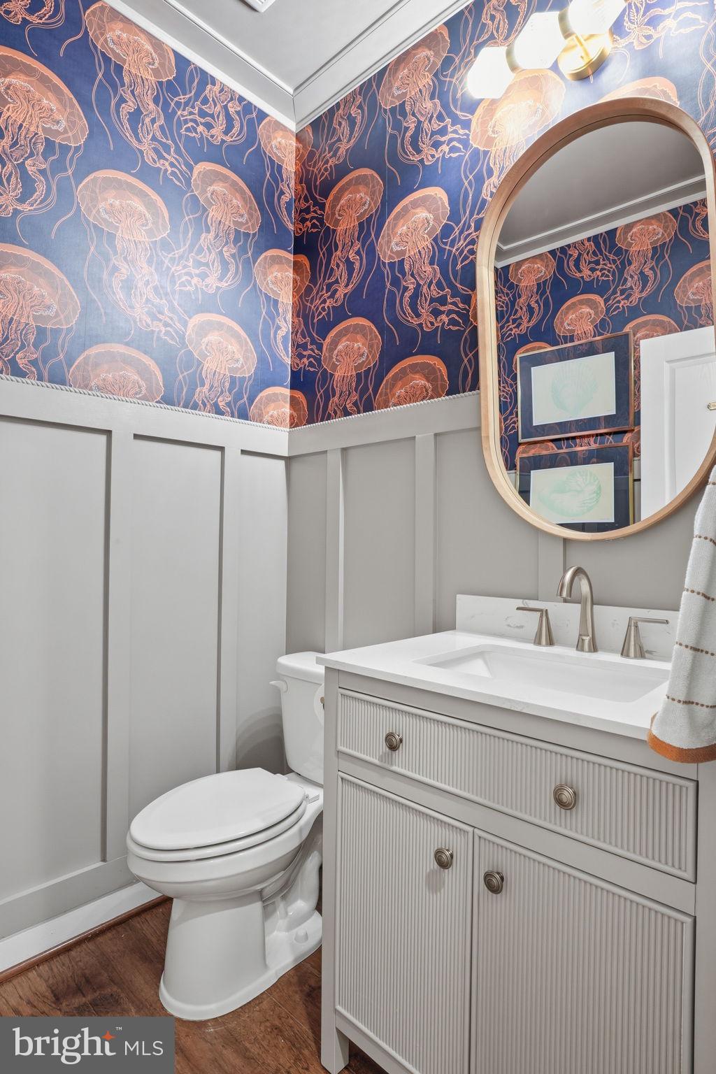 126 Admirals Ridge Drive Arnold, MD 21012 - Photo 14 of 58 a bathroom with a toilet sink and mirror