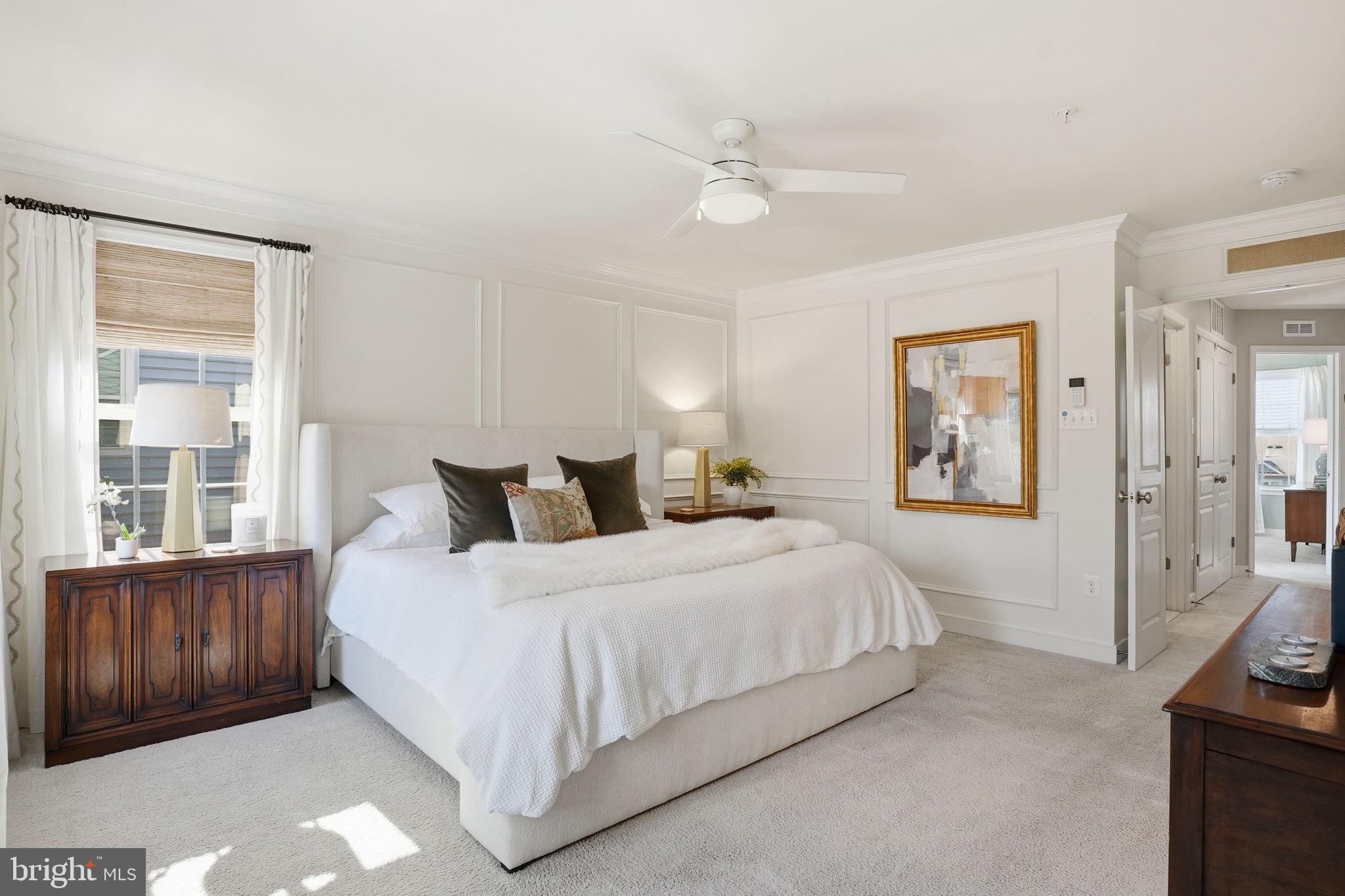 126 Admirals Ridge Drive Arnold, MD 21012 - Photo 17 of 58 a bedroom with a large bed and a tv