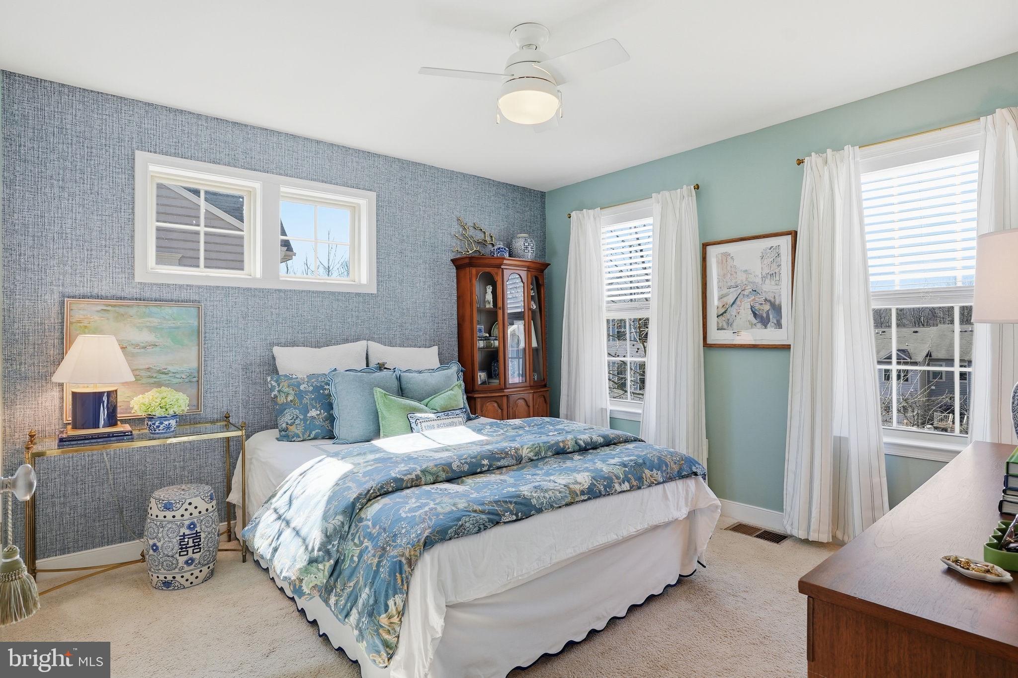 126 Admirals Ridge Drive Arnold, MD 21012 - Photo 22 of 58 a bedroom with bed and night stand