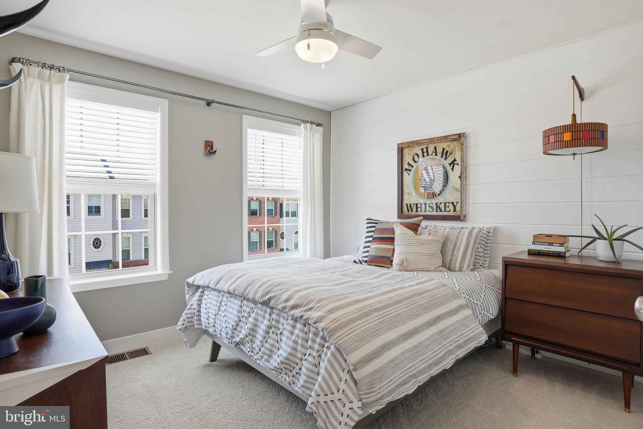 126 Admirals Ridge Drive Arnold, MD 21012 - Photo 25 of 58 a bedroom with a bed and a window