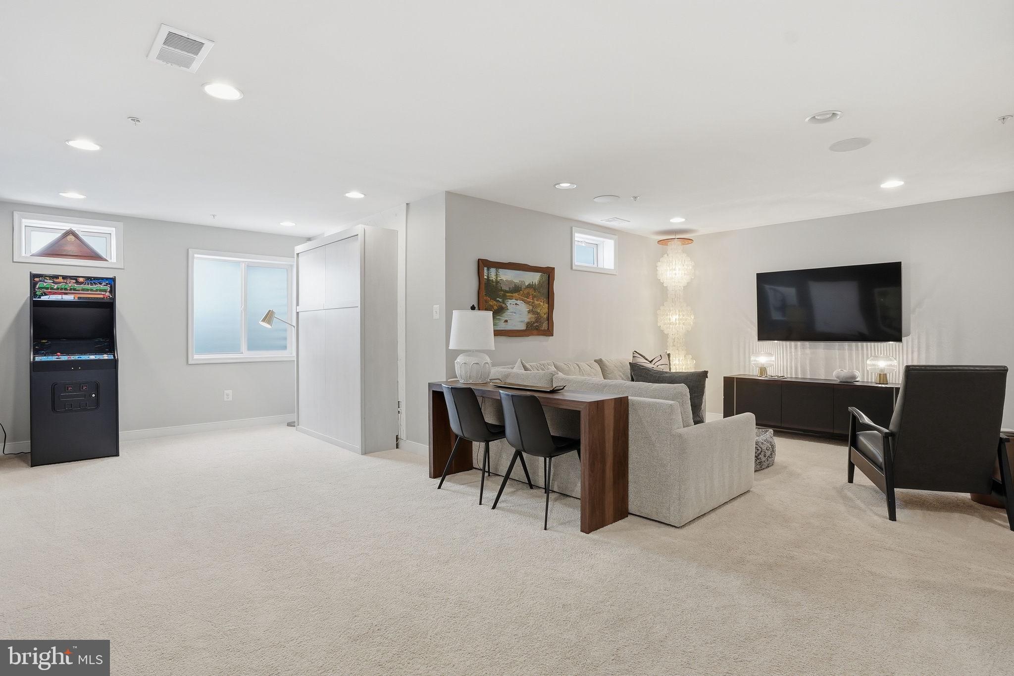 126 Admirals Ridge Drive Arnold, MD 21012 - Photo 29 of 58 a living room with furniture and a flat screen tv