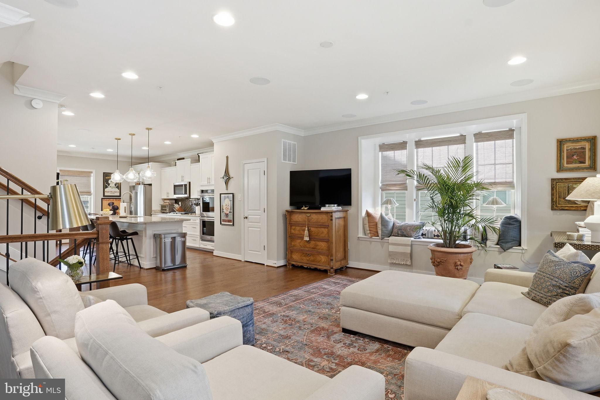 126 Admirals Ridge Drive Arnold, MD 21012 - Photo 6 of 58 a living room with furniture and a flat screen tv