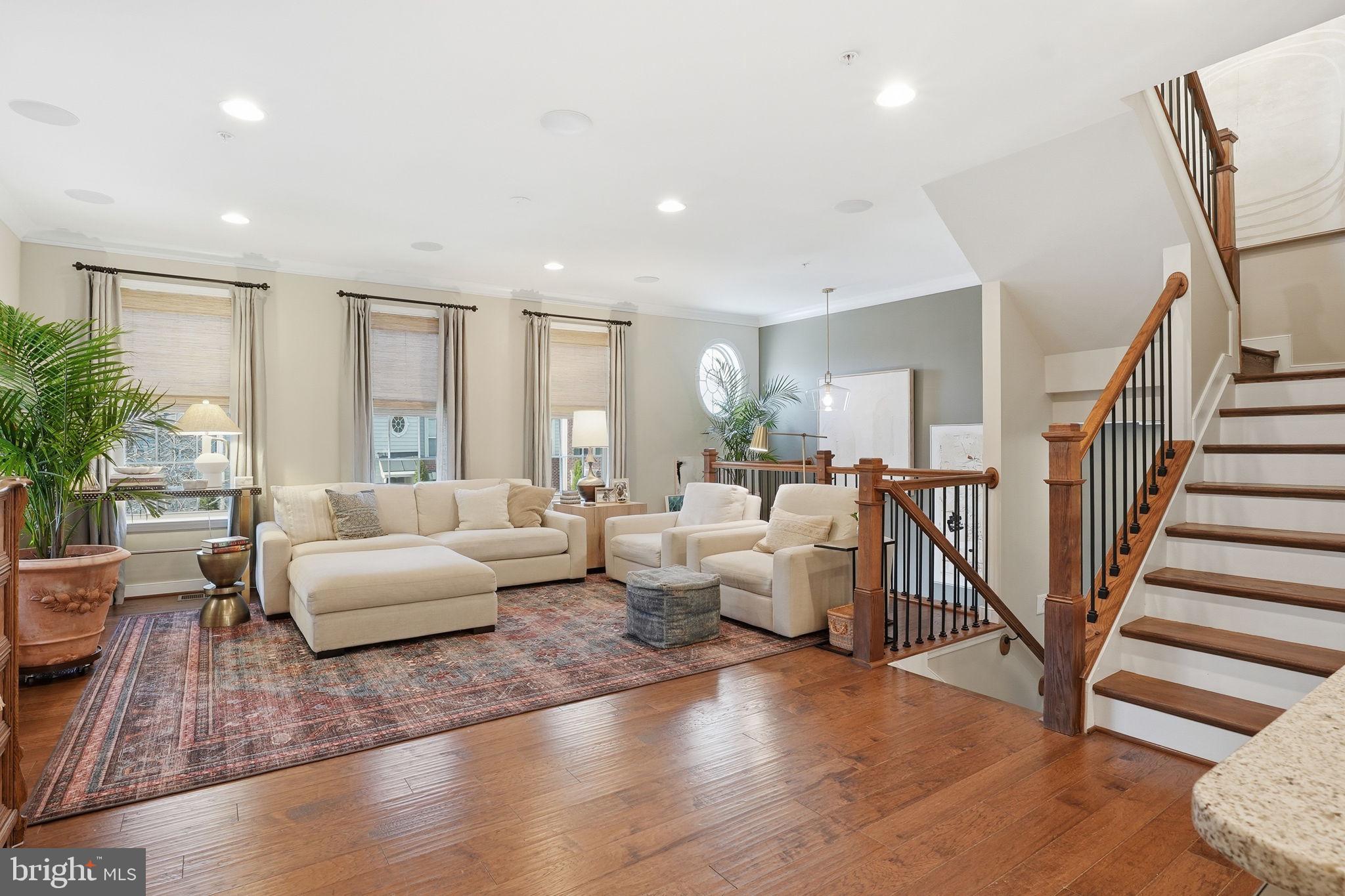126 Admirals Ridge Drive Arnold, MD 21012 - Photo 8 of 58 a living room with furniture and a wooden floor