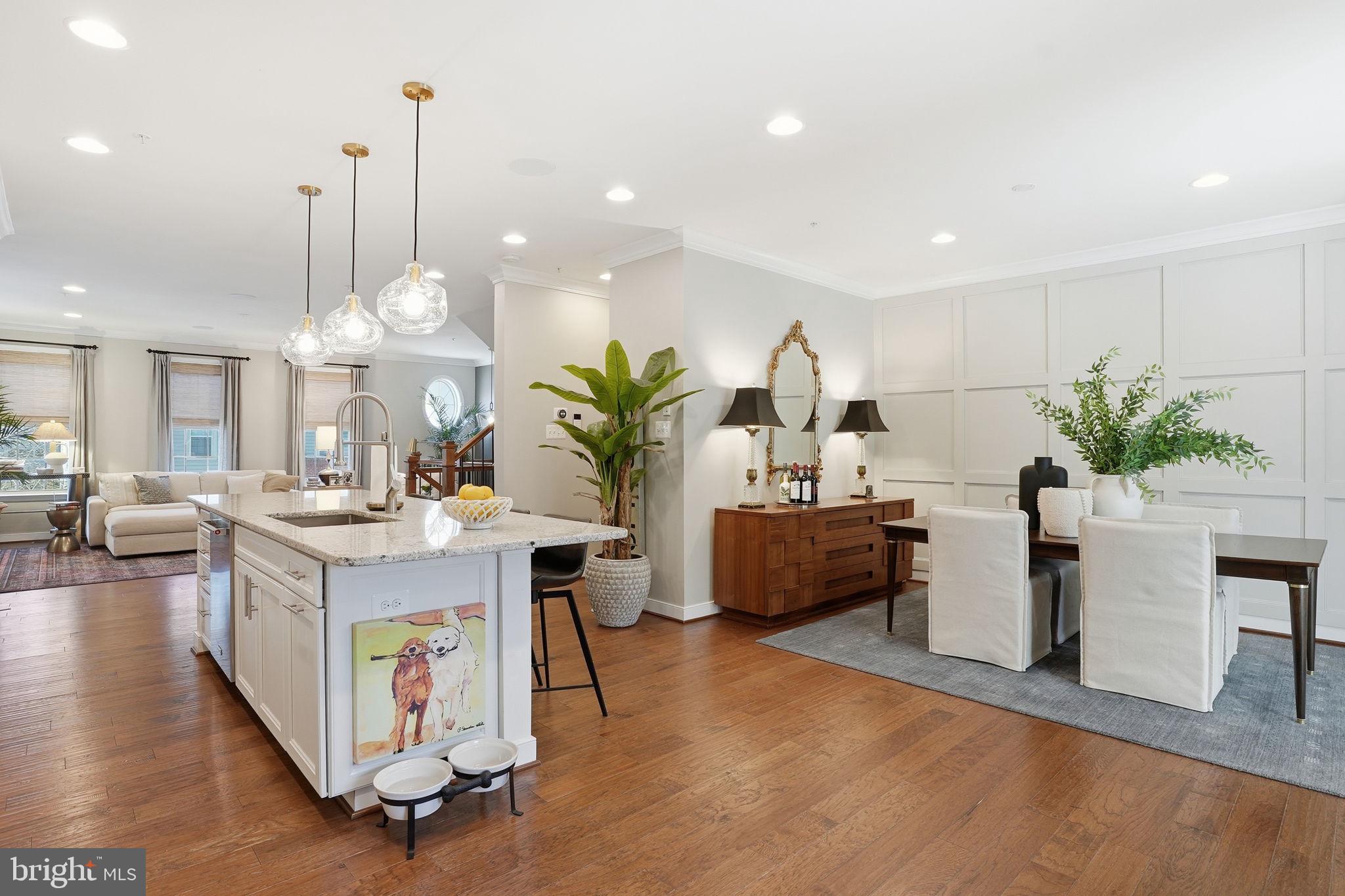 126 Admirals Ridge Drive Arnold, MD 21012 - Photo 10 of 58 a living room with kitchen island furniture and a chandelier