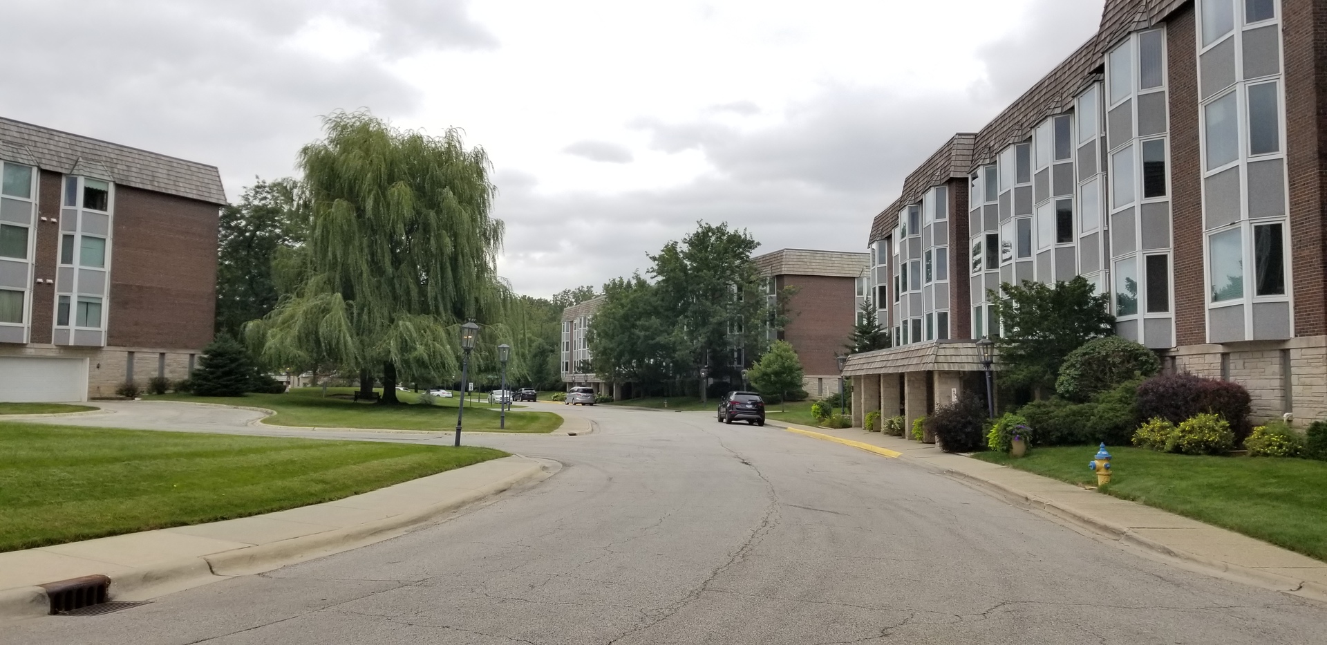 a view of a building with a yard