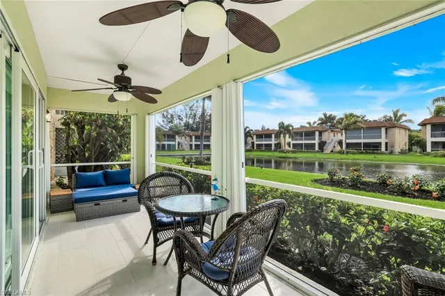 a view of a patio with a yard