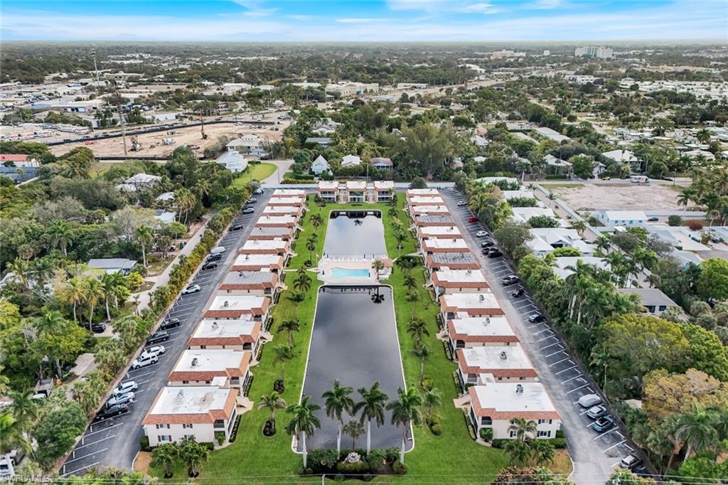 1155 Sandpiper Street, Unit C7 Naples, FL 34102 - Photo 23 of 23 an aerial view of a city