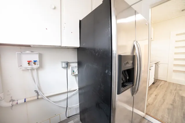 a view of kitchen and utility room