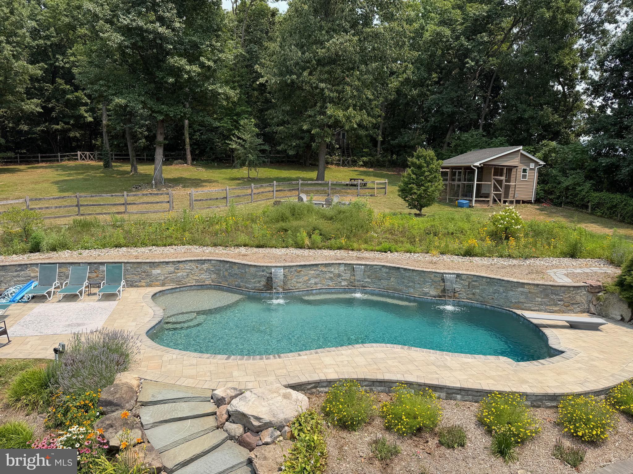 Serene oasis with a sparkling pool.
