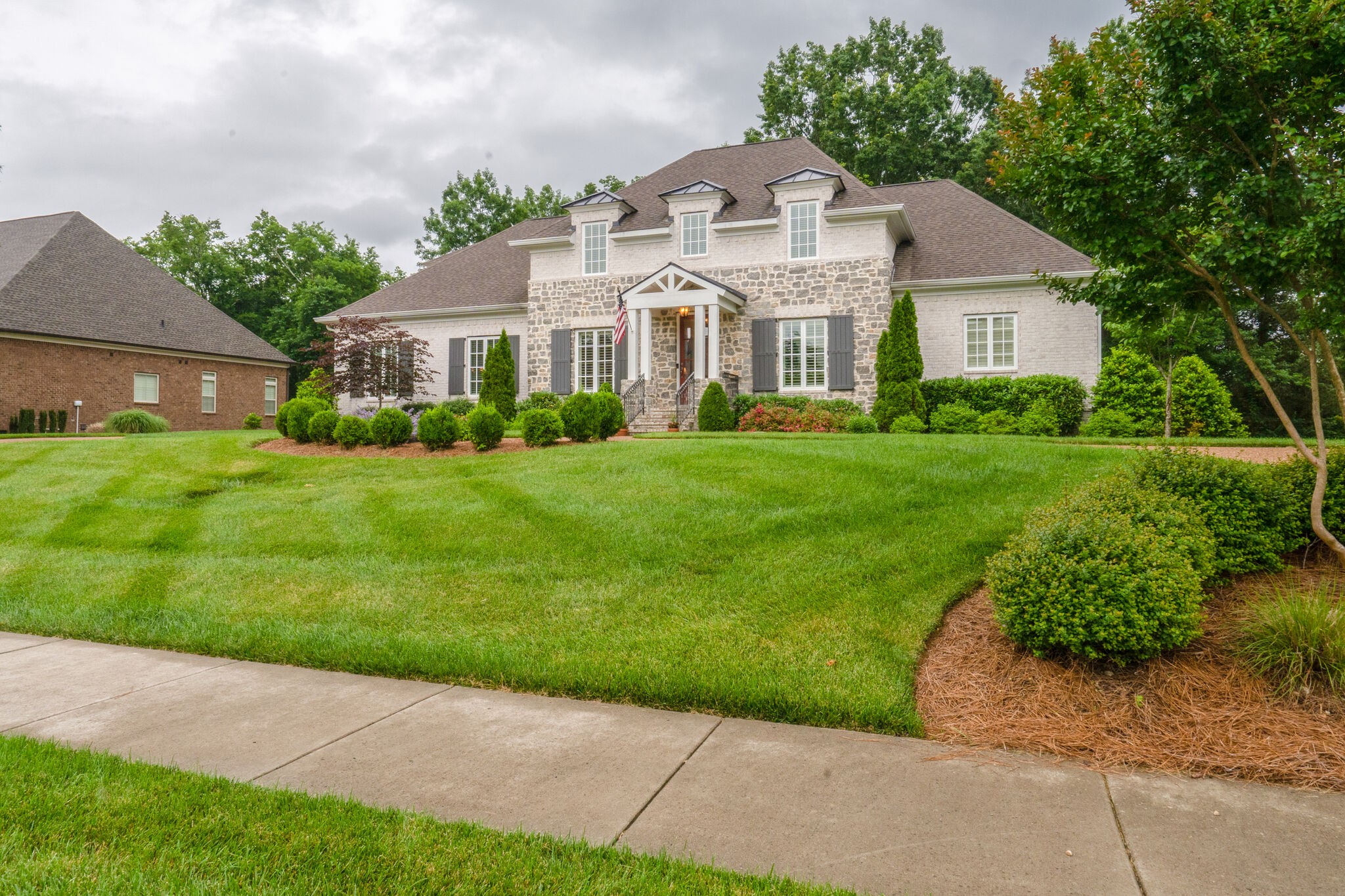 2218 Dunblane Lane Franklin, TN 37069 - Photo 2 of 23 a front view of a house with a yard