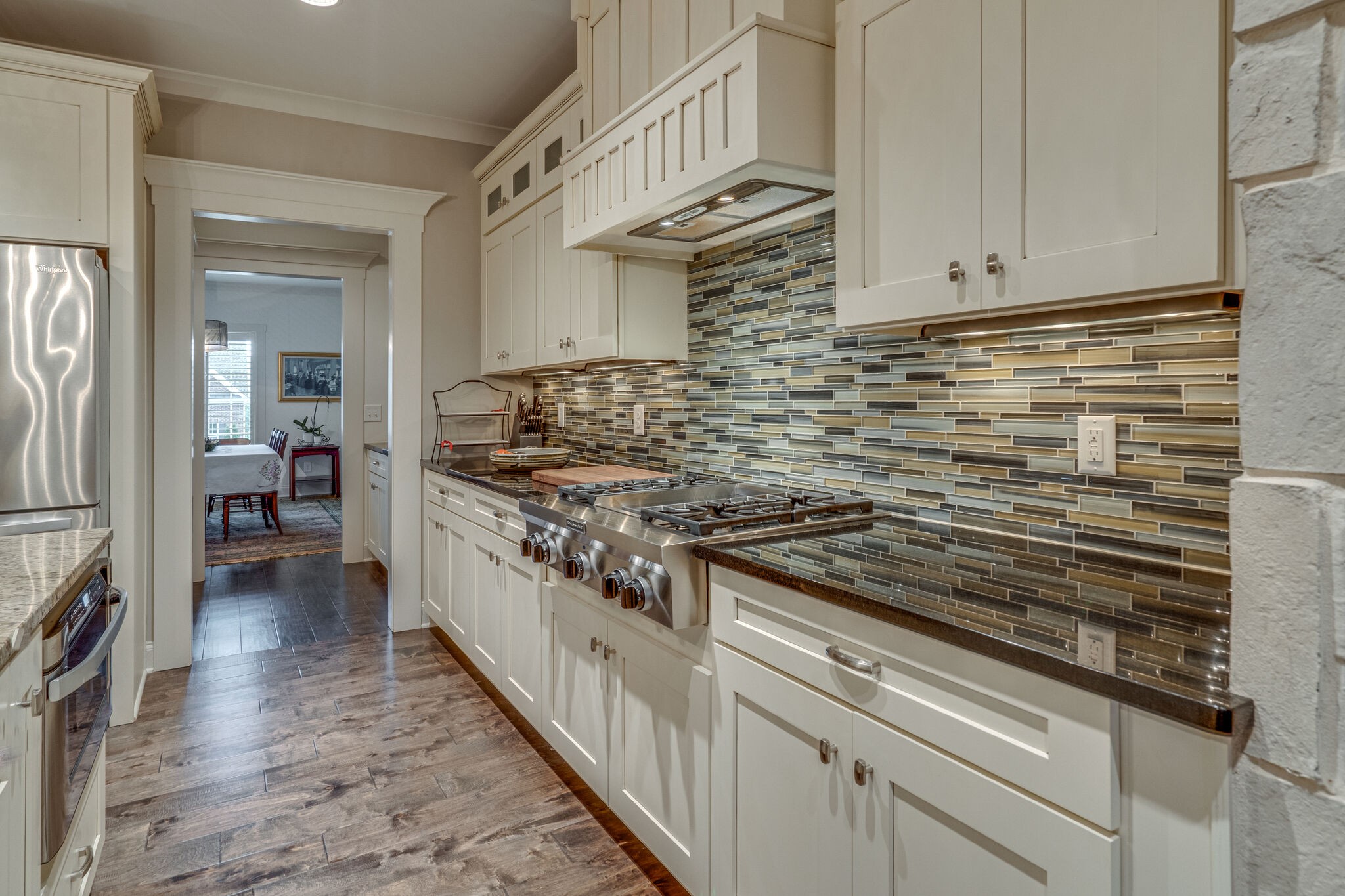 2218 Dunblane Lane Franklin, TN 37069 - Photo 11 of 23 a kitchen with stainless steel appliances granite countertop a stove and cabinets