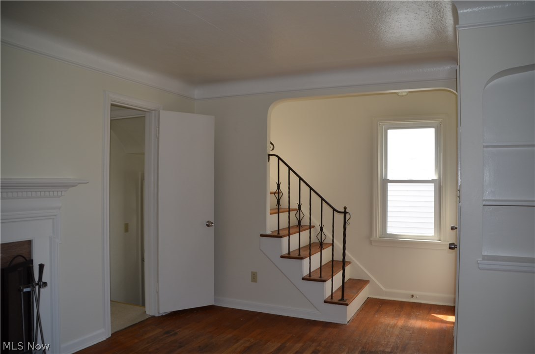 4114 Stilmore Road Cleveland, OH 44121 - Photo 7 of 30 STAIRCASE OFF LIVING ROOM