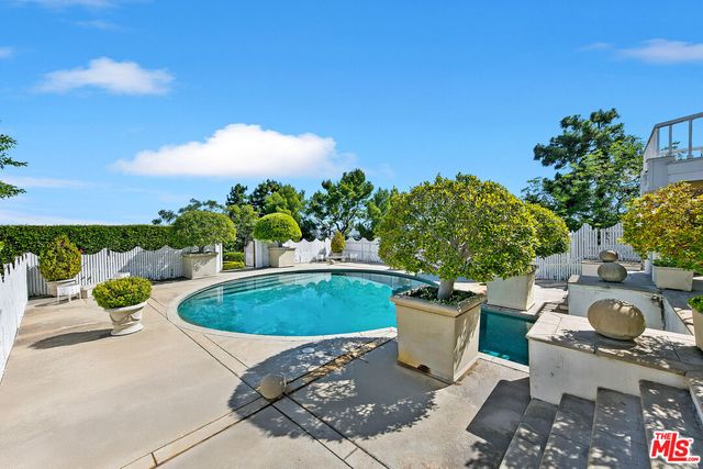 a view of a living room and a large window