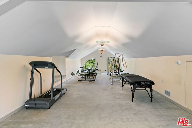 an aerial view of house with yard swimming pool and outdoor seating