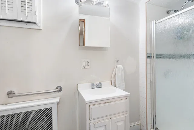a bathroom with a sink and a vanity