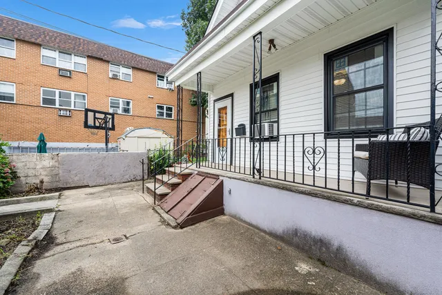 a view of a porch with furniture