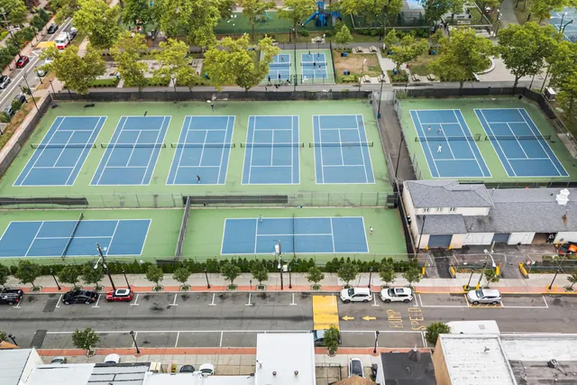 a view of a building with backyard