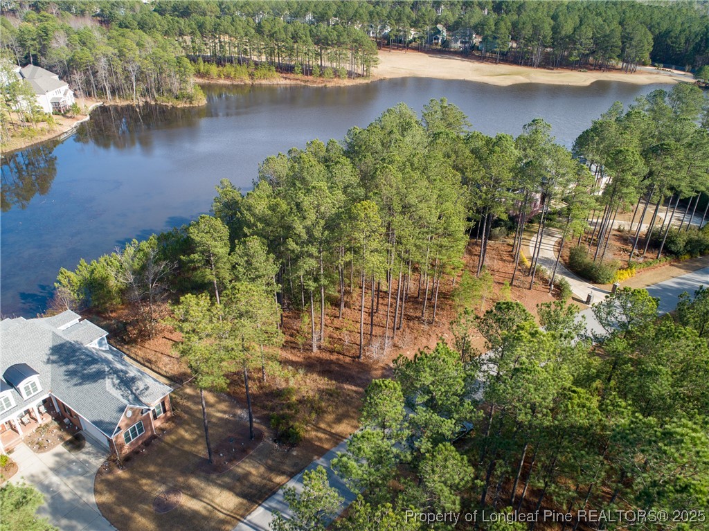 102 Broadlake Lane Spring Lake, NC 28390 - Photo 7 of 12 an aerial view of residential houses with outdoor space and lake view