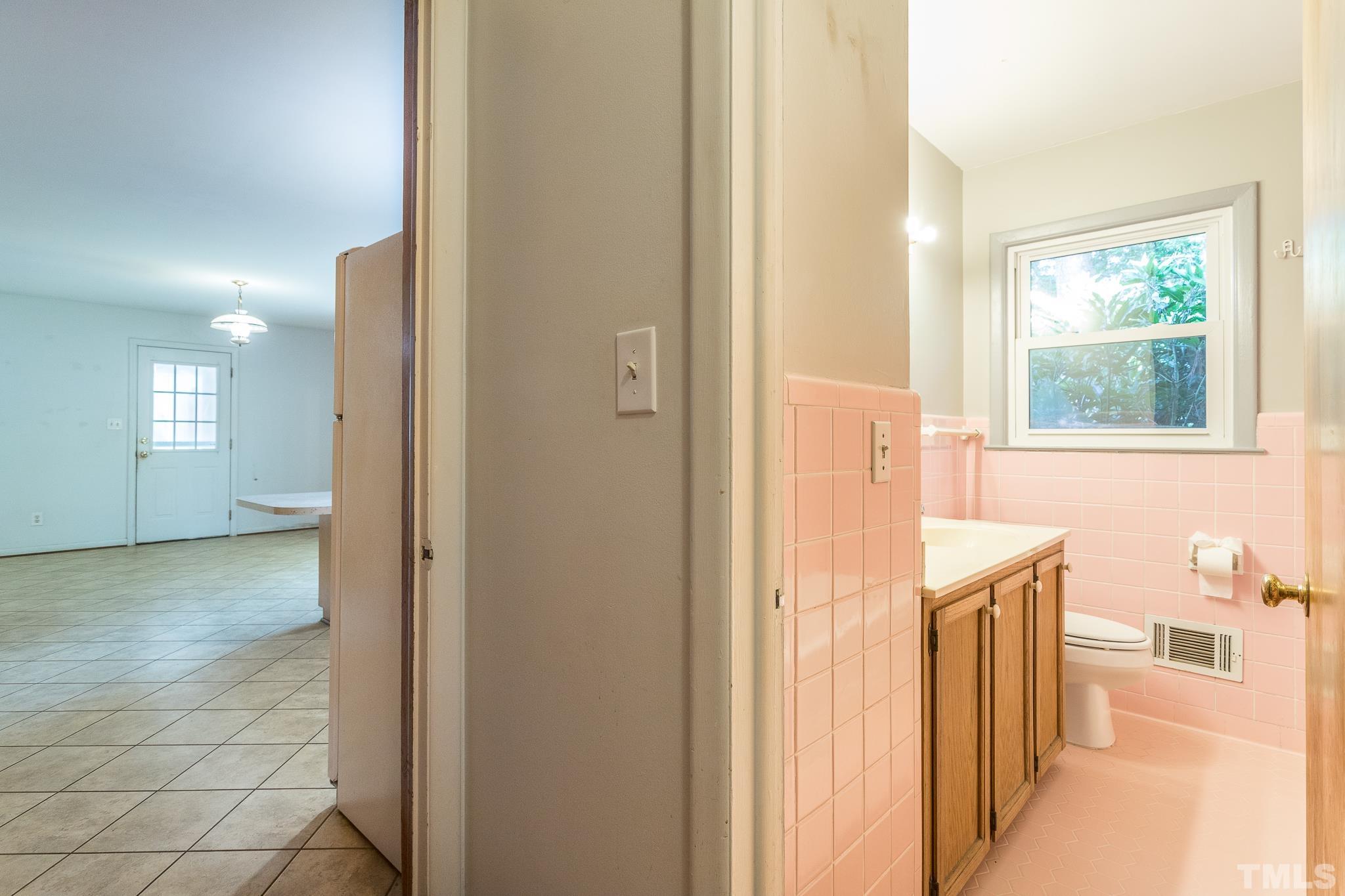 5109 Lead Mine Road Raleigh, NC 27612 - Photo 29 of 30 a view of a hallway with windows and entryway