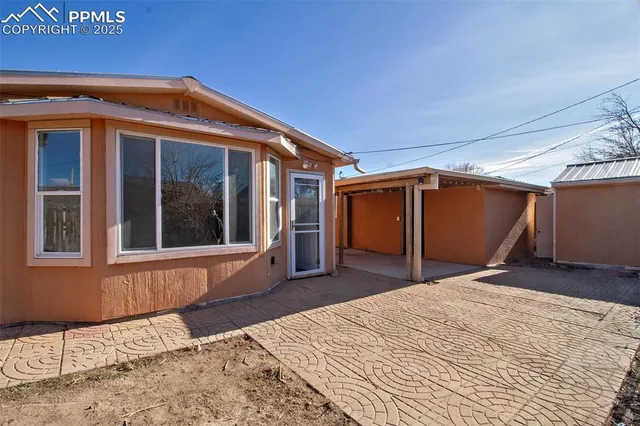 a house view with a backyard space