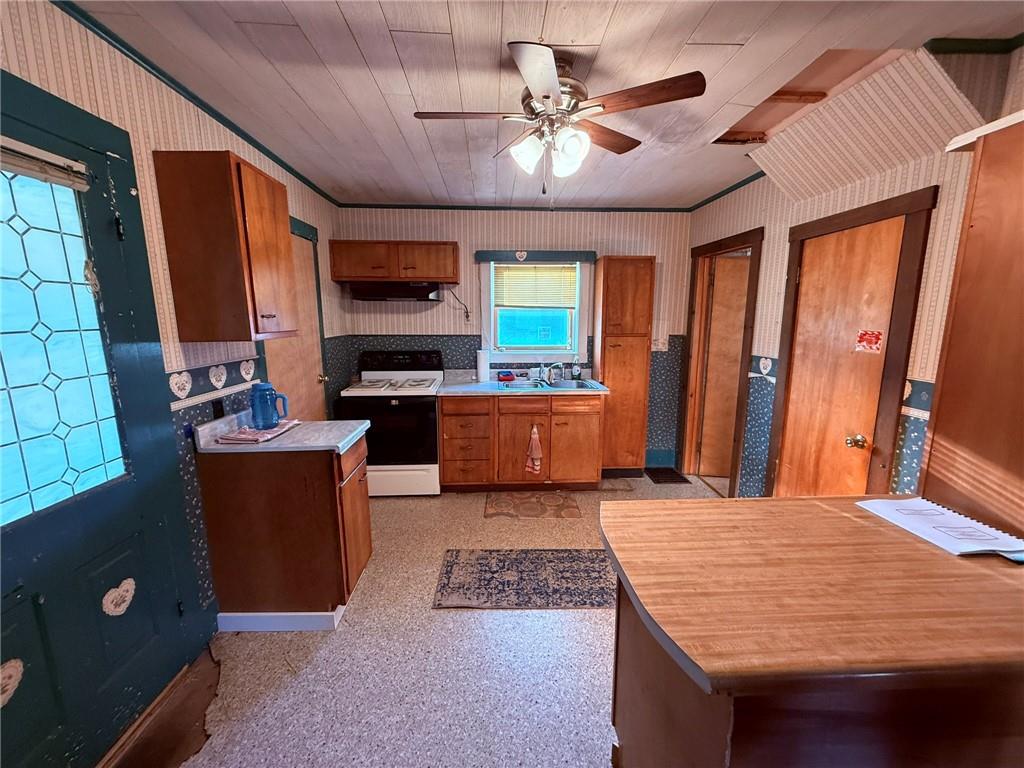 658 Highway 536 Mayport, PA 16240 - Photo 5 of 13 a living room with furniture a flat screen tv and a fireplace