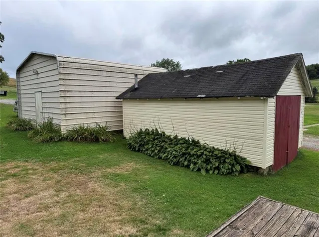 a view of a back yard of the house