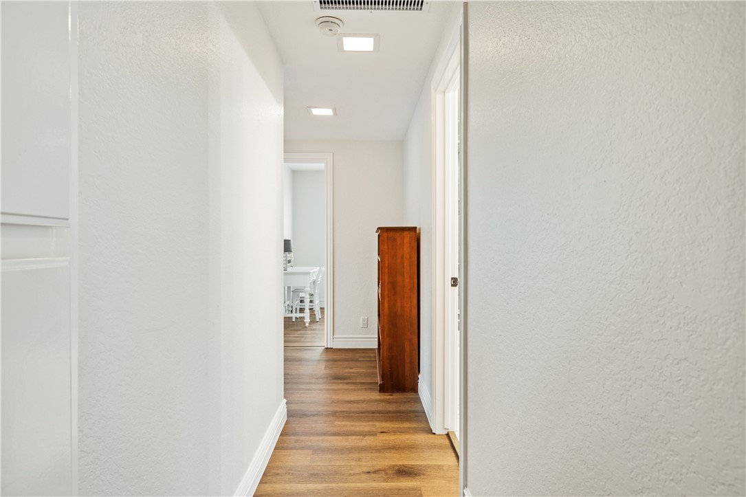 2126 Baseline Road La Verne, CA 91750 - Photo 17 of 39 a view of a hallway with wooden floor