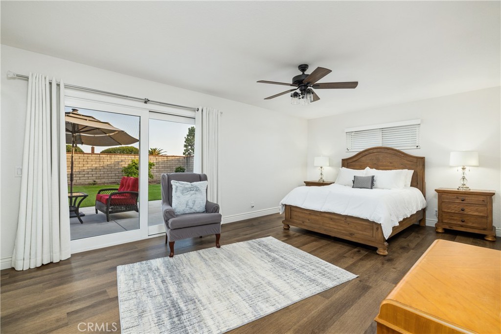 2126 Baseline Road La Verne, CA 91750 - Photo 18 of 39 a bedroom with a bed and wooden floor