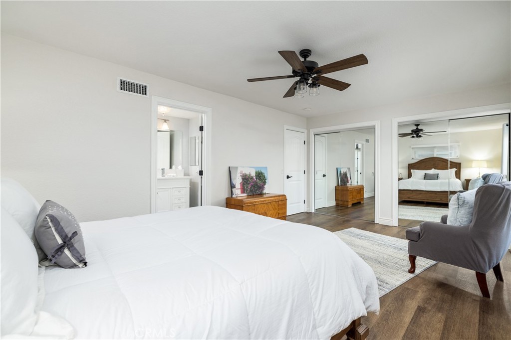 2126 Baseline Road La Verne, CA 91750 - Photo 19 of 39 a bedroom with a bed and a chandelier